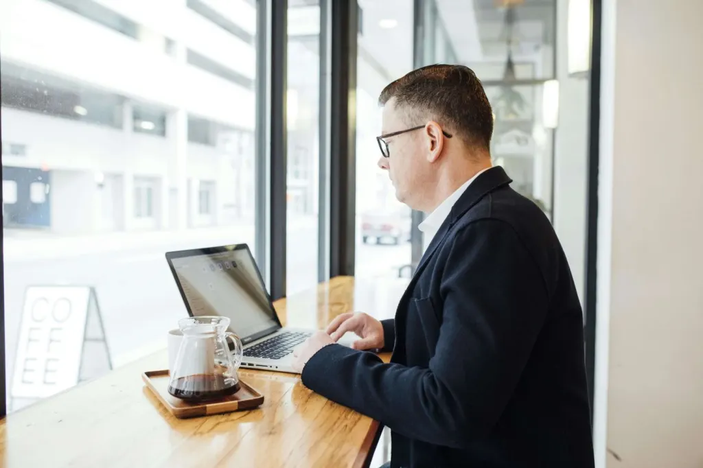 A business man typing on a laptop. |men's therapy san francisco, ca | online men's issues counseling California | online men's therapy san francisco, ca |  94608 | 94609 | 94061